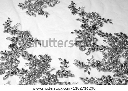 Texture, pattern. Luxurious fabric of beads 3B Black lace fabric. I offer a variety of lace fabric, it is widely used for your design, fashion screensavers and backgrounds.
