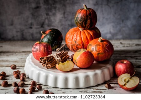 Pumpkin, Apple, Hazelnut and Cinnamon Pie Ingredients, copy space for your text
