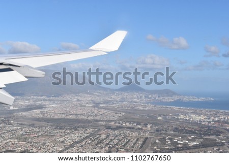 View over Cape Town by plane with the big Table Mountain, Signal Hill and Lions Head, South Africa Royalty-Free Stock Photo #1102767650
