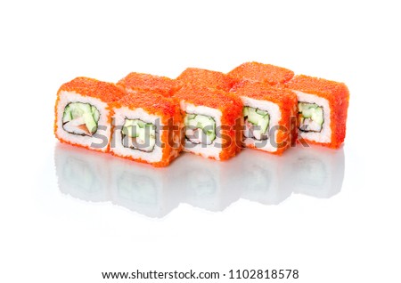 sushi rolls California with shrimp and orange caviar on white glass background with reflection