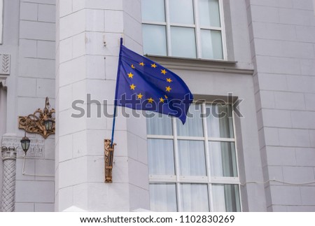 European Union Flag in the Wind Hanging on Public Institution