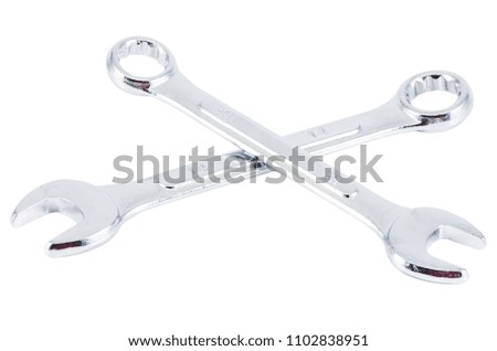 Couple of wrenchs chrome metal spanner instruments isolated over white background,clipping path
