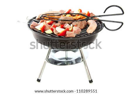 Barbeque with different kind of meat isolated over white