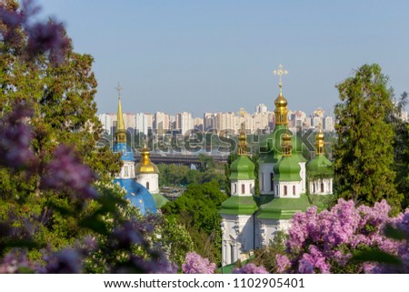 Bright colors in Kiev botanical garden at spring time and beautiful view to Dnipro river.