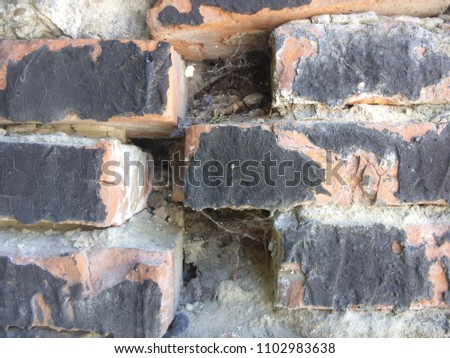 Brick texture with scratches and cracks. Old brick wall with dumped bricks. Background, texture red brick. Vintage style. Space. Background for the designer. old brick masonry wall
