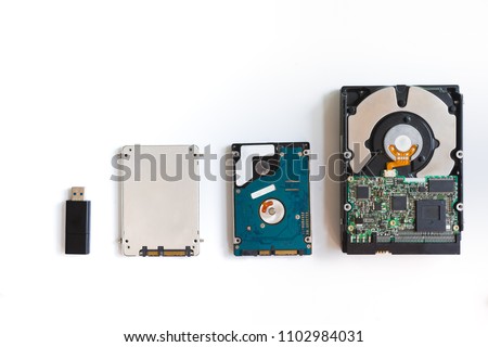 Storage device such as Hard disk drives, External hard drive, USB flash drive and Solit state drive on white background. Royalty-Free Stock Photo #1102984031
