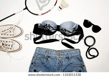 fashionable clothes for sports on the beach on a white background