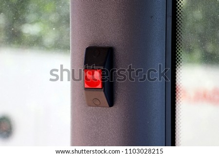Stop button on the bus