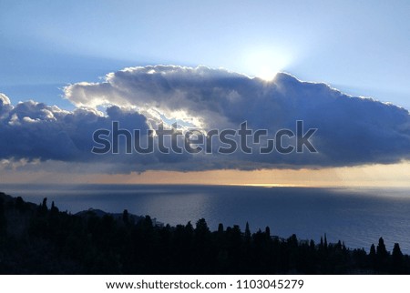 sun ray passing through the cloud