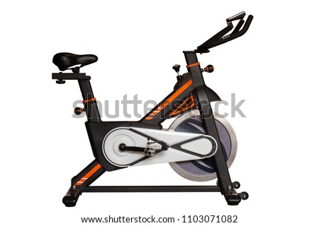 Spinning bike for exercise in gym or fitness isolated on white background with clipping path. Royalty-Free Stock Photo #1103071082
