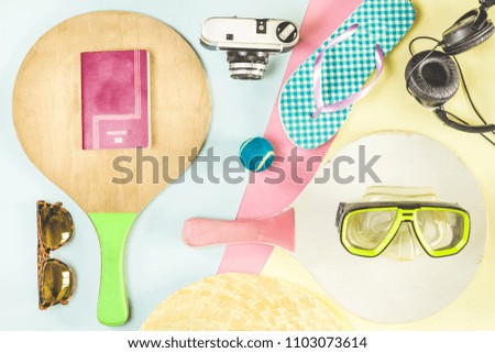 Summer accessories,Objects for the beach and travel. flip-flops, camera, hat, sunglasses, music helmets, passport. Concept of trips