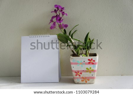 Background of grey with mock up note paper and space