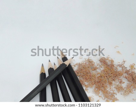 Pencils sharpened and have debris of pencils