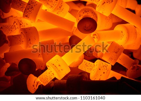 pile of hot steel parts Royalty-Free Stock Photo #1103161040