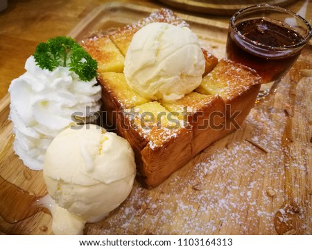 Vanilla  Honey Toast on Wooden Plate