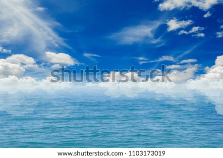 A picture of the sky with the beautiful sea.