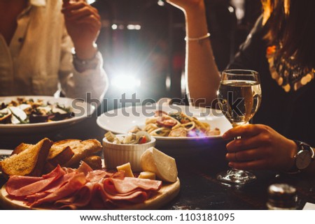 People have a elegant dinner  Royalty-Free Stock Photo #1103181095