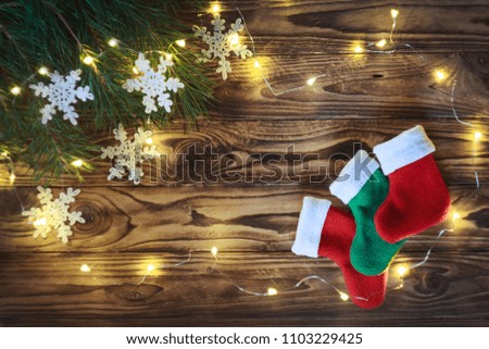 Christmas socks on wooden background