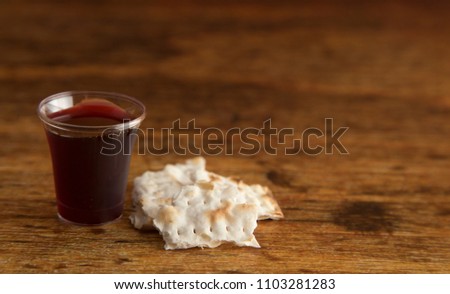Christian Communion on a Wooden Table Royalty-Free Stock Photo #1103281283