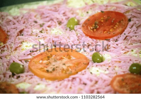 Pizza with tomatoes and cheese