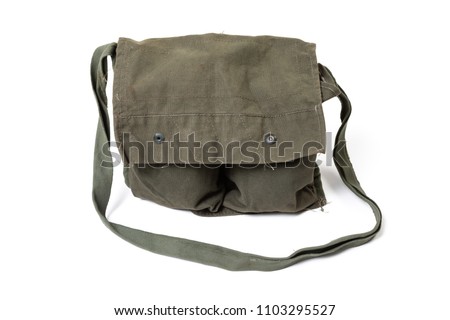 Vintage US Army carrying sack, worn on the back, made of green canvas, isolated on white