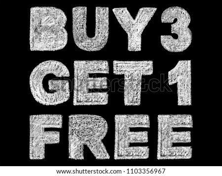 handwritten white bold chalk lettering buy 3 get 1 free text on black background, hand-drawn chalk phrase, back to school concept, stock photo image