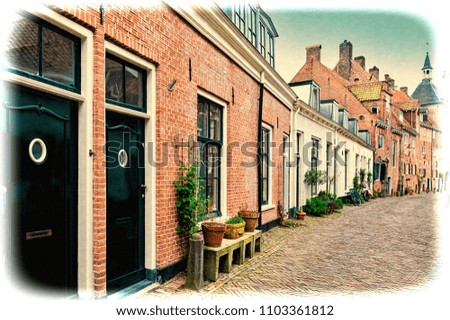 Typical Dutch brick houses in Holland. Street View with bikes parked in the historical center of Amersfoort in the Netherlands. Vintage style toned picture