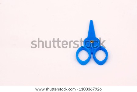 blue scissors isolated on a white background