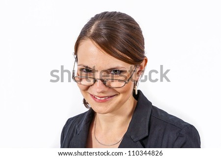Close-up young beautiful woman with reading glasses on white background