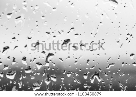 raindrops on the window, black and white background