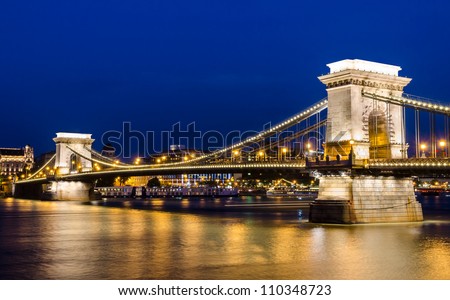 The Szechenyi Chain Bridge is a suspension bridge that spans the River Danube of Budapest, the capital of Hungary. Royalty-Free Stock Photo #110348723