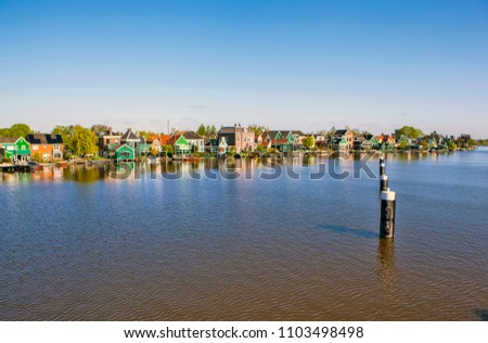A village on the banks of the Zaan River. Zandeyk. Netherlands