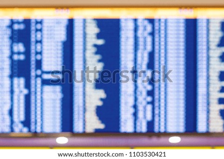 Natural blur background of electronic arrival or departure board in Airport