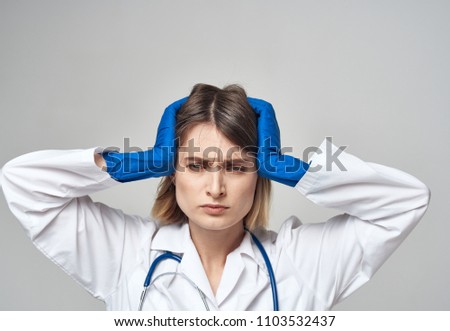  doctor holding his head medicine                              