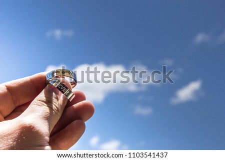 Happy Forever Ring in blue sky