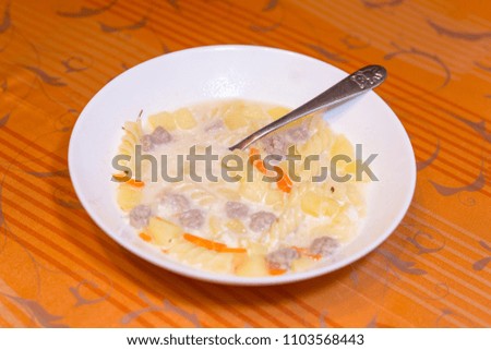 A simple soup plate on the table