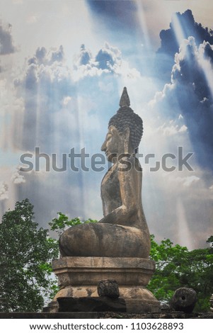 Stucco statues in old Sukhothai temples, with clouds and sunlight behind.