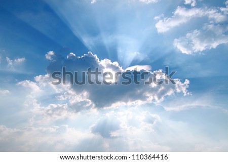 Sunbeam  through the haze on blue sky: can be used as background and dramatic look