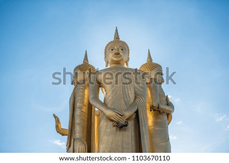 Three Buddha is very beautiful blue sky sun light