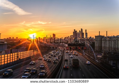 Highway traffic in sunset in Moscow