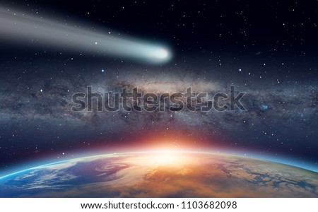 Comet on the space - Planet Earth in front of the Milky Way galaxy "Elements of this image furnished by NASA "