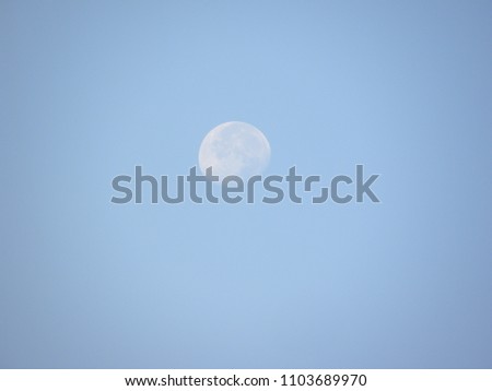 Abstract Moon and blue sky background