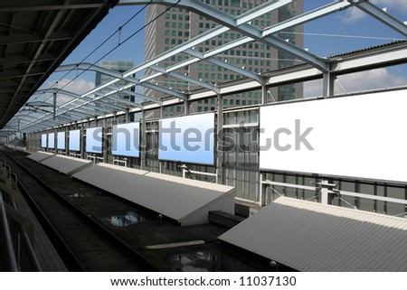 Blank billboards in a subway station