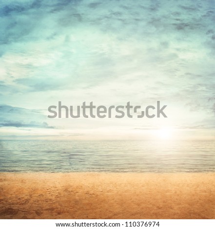 Summer background with cloudscape and calm sea water on sand beach on a tropic island