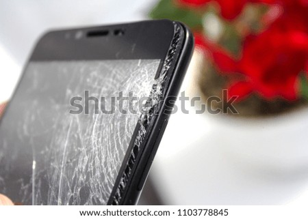 Broken phone. Phone with a broken screen