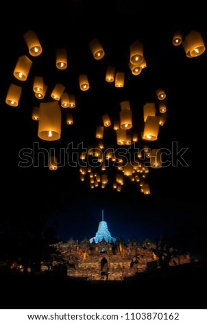 People fly lanterns during the Vesak Day celebration at Borobudur Temple in Magelang, Indonesia, on May 29, 2018. Buddhists in Indonesia celebrated the annual Vesak Day on Tuesday. Royalty-Free Stock Photo #1103870162