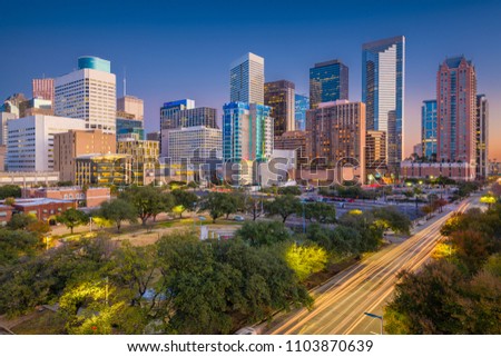 Houston, Texas, USA downtown park skyline at twilight.