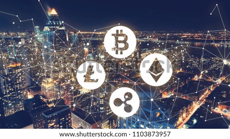 Cryptocurrency with the New York City skyline at night