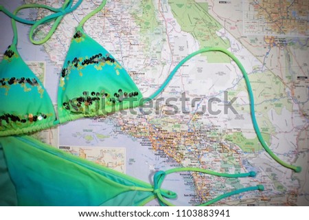 A string bikini pictured with a map of California.
