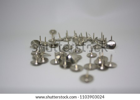 small tacks with white background